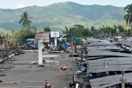 Cảnh đổ nát sau vụ cháy. (Nguồn: AFP/TTXVN)