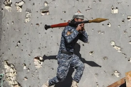 Binh sỹ Iraq tấn công vào thị trấn Husayba, thung lũng Euphrates, ngoại ô thành phố Ramadi. (Nguồn: AFP/TTXVN)