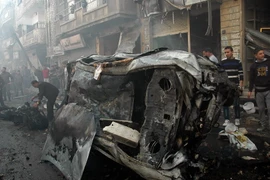 Hiện trường một vụ đánh bom xe ở Homs, Syria. (Nguồn:　AFP/TTXVN