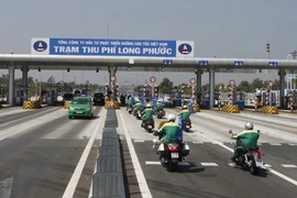 Lễ diễu hành thông xe toàn tuyến cao tốc Thành phố Hồ Chí Minh-Long Thành-Dầu Giây. (Ảnh: Hoàng Hải/TTXVN)