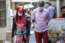 Những người phụ nữ da màu gánh chịu áp lực lớn. (Nguồn: EPA/EFE)