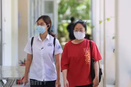 Thí sinh dự tốt nghiệp trung học phổ thông. (Ảnh: Minh Sơn/Vietnam+)
