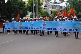 Diễu hành hưởng ứng Ngày phòng chống mua bán người năm 2019. (Ảnh: Quang Duy/TTXVN)
