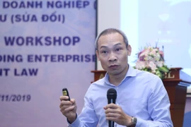 Phó Viện trưởng Viện Nghiên cứu Quản lý kinh tế Trung ương Phan Đức Hiếu (Ảnh: Danh Lam/TTXVN)