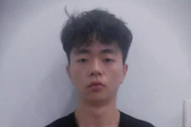 Một trong 9 đối tượng người Trung Quốc bị Công an Thành phố Hồ Chí Minh tạm giữ điều tra về hành vi cho vay nặng lãi. (Nguồn: TTXVN)