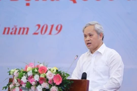 Tổng Cục Trưởng Tổng cục Thống kê Nguyễn Bích Lâm báo cáo thống kê về năng suất lao động của Việt Nam. (Ảnh: Danh Lam/TTXVN)