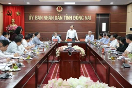 Bộ trưởng Bộ Tài chính Đinh Tiến Dũng, Phó Ban Chỉ đạo 389 quốc gia chủ trì buổi làm việc với lãnh đạo tỉnh Đồng Nai. (Ảnh: Sỹ Tuyên/TTXVN)