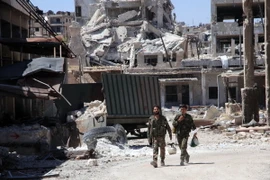 Binh sỹ Syria làm nhiệm vụ tại Aleppo ngày 28/7. (Nguồn: EPA/TTXVN) 