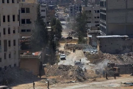 Quang cảnh cửa ngõ thành phố Bani Zeid sau khi lực lượng ủng hộ Chính phủ giành quyền kiểm soát Leramun, ngoại ô phía Tây Bắc của Aleppo. (Nguồn: AFP/TTXVN) 