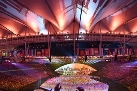 Màn trình diễn nghệ thuật tại lễ khai mạc Olympic Rio 2016 trên sân Maracana ngày 5/8. (Nguồn: AFP/TTXVN)