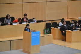 Bộ trưởng Bộ Y tế Việt Nam Nguyễn Thị Kim Tiến phát biểu tại phiên họp toàn thể Đại hội đồng WHO. (Ảnh: Hoàng Hoa/TTXVN) 