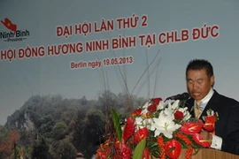 Ông Nguyễn Bình Định, Chủ tịch hội đọc báo cáo tổng kết. (Ảnh: Thanh Hải/Vietnam+) 