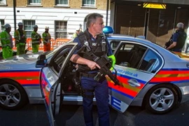 Cảnh sát Anh tuần tra trên đường phố. (Nguồn: PA)