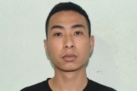 Đối tượng Nguyễn Văn Độ tại cơ quan công an. (Ảnh: TTXVN phát)