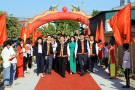 Ông Nguyễn Xuân Thắng dự Ngày hội Đại đoàn kết toàn dân tộc tại xã Quảng Tân, huyện Đầm Hà tỉnh Quảng Ninh. (Ảnh: TTXVN phát)