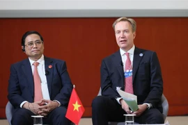 Thủ tướng Phạm Minh Chính và Chủ tịch Diễn đàn Kinh tế thế giới (WEF) Børge Brende tại phiên Đối thoại Chiến lược Quốc gia Việt Nam-WEF. (Ảnh: Dương Giang/TTXVN)