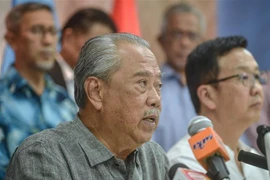Cựu Thủ tướng Malaysia Muhyiddin Yassin phát biểu tại cuộc họp báo ở Kuala Lumpur, Malaysia, ngày 24/11/2022. (Ảnh: AFP/TTXVN)