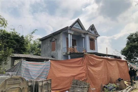 Ngôi nhà tại thôn Tân Lập xã Trung Hòa, huyện Chiêm Hóa, tỉnh Tuyên Quang nơi xảy ra vụ việc thương tâm. (Ảnh: TTXVN phát)