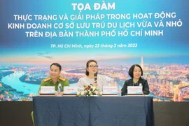 Đại diện Ban tổ chức và sở, ngành Thành phố Hồ Chí Minh chủ trì phiên thảo luận tại tọa đàm. (Ảnh: Mỹ Phương/TTXVN)