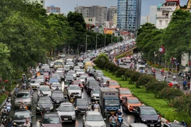 [Photo] Hà Nội: Mưa lớn gây tắc nghẽn khiến đường về nhà thêm gian nan