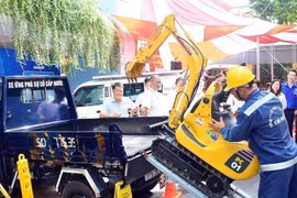 Giới thiệu mô hình sáng tạo, ứng dụng công nghệ trong quản lý hệ thống cấp nước TP. Hồ Chí Minh. (Ảnh: Anh Tuấn/TTXVN)