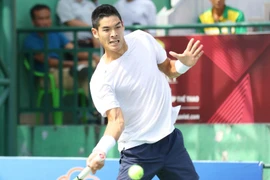 Vận động viên Thái Sơn Kwiatkiowski (Hưng Thịnh - Thành phố Hồ Chí Minh) trong trận thắng vận động viên Nguyễn Văn Phương (câu lạc bộ Hải Đăng). (Ảnh: Thanh Vũ/TTXVN)