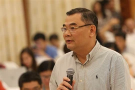 Thiếu tướng Tô Ân Xô, Chánh văn phòng Bộ Công an trả lời câu hỏi của phóng viên. (Ảnh: Dương Giang/TTXVN)