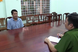 Đối tượng Chu Văn Thảo là nghi can trong vụ án ra đầu thú tại cơ quan công an. (Ảnh : Nguyễn Văn Việt/TTXVN)