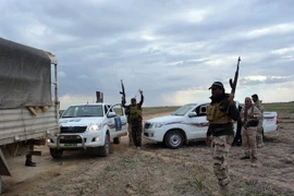 Binh sỹ quân đội Iraq sau khi giành lại một khu vực từ tay IS ở phía bắc tỉnh Diyala. (Nguồn: AFP/TTXVN)