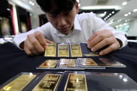 Tại sàn giao dịch vàng Hàn Quốc ở Seoul. (Nguồn: YONHAP/TTXVN)