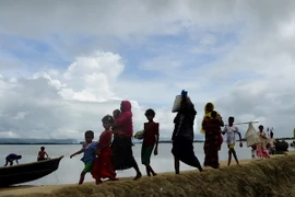 Người Hồi giáo Rohingya vượt biên sang Bangladesh lánh nạn do tình trạng bạo lực tại bang Rakhine. (Nguồn: AFP/TTXVN)