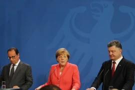 Lãnh đạo ba nước Đức, Pháp và Ukraine kêu gọi thực thi thoả Thuận hòa bình Minsk. (Nguồn: AFP/TTXVN)
