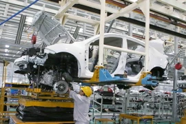 Lắp ráp ôtô tại cơ sở của công ty trong Khu Phức hợp Chu Lai-Trường Hải (Quảng Nam). (Ảnh: Trần Lê Lâm/TTXVN) 