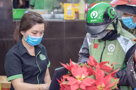 GoBiz hỗ trợ các nhà hàng, quán ăn chủ động quản lý đơn hàng GoFood, và hạn chế sai sót về đơn hàng. (Ảnh: T.Uyên/Vietnam+)