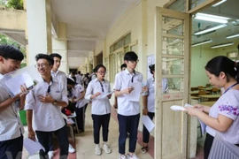 Thí sinh dự thi trung học phổ thông quốc gia. (Ảnh: Lê Minh Sơn/Vietnam+)