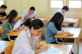 Thí sinh dự thi trung học phổ thông quốc gia 2018. (Ảnh: Lê Minh Sơn/Vietnam+)