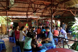 Người dân Cần Thơ làm du lịch cộng đồng. (Ảnh: Xuân Mai/Vietnam+)