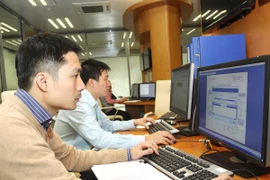 Phiên đấu thầu trái phiếu Chính phủ. (Ảnh minh họa. Nguồn: TTXVN)