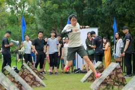 Vào dịp nghỉ lễ 30/4-1/5 năm nay, giới trẻ Thủ đô đã có dịp được khám phá một game nhập vai thực tế với quy mô cực lớn mang tên Giải mã EP. (Ảnh: Đoàn Quang/Vietnam+)