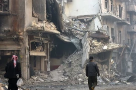 Cảnh đổ nát sau những đợt không kích ở thị trấn al-Bab ngày 18/1. (Nguồn: AFP/TTXVN)