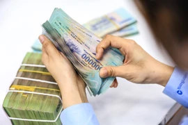 Ngân hàng Nhà nước cấm các nhà băng cho khách vay vốn để gửi tiền