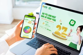 OCB tung ưu đãi cho khách hàng gửi tiết kiệm trực tuyến trên OCB OMNI. (Ảnh: PV/Vietnam+)
