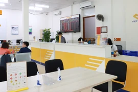 LPBank và Bưu điện Việt Nam cam kết đảm bảo quyền lợi của khách hàng ở mức cao nhất. (Ảnh: PV/Vietnam+)
