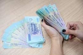 Lãi suất tiết kiệm tại 4 ngân hàng lớn nhất Việt Nam đã giảm xuống mức thấp lịch sử. (Ảnh: PV/Vietnam+)