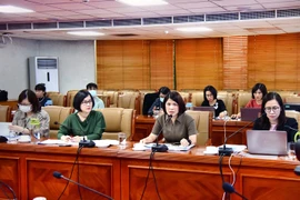 Lãnh đạo VietinBank thảo luận với cổ đông và nhà đầu tư tại Hội nghị cập nhật kết quả kinh doanh hàng quý. (Ảnh: PV/Vietnam+)