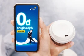 VIB miễn 100% phí các giao dịch thường xuyên. (Ảnh: Vietnam+)