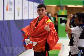 Vận động viên Huy Hoàng là 1 trong số 14 vận động viên sẽ tham gia Olympic Tokyo 2020 ở môn bơi. (Ảnh: Vũ Anh Tú/TTXVN)