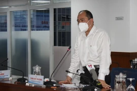 Ông Tăng Chí Thượng, Phó Giám đốc Sở Y tế Thành phố Hồ Chí Minh thông tin về công tác phòng chống dịch. (Ảnh: Xuân Anh/TTXVN)