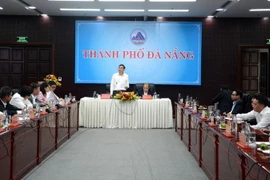 Quang cảnh buổi gặp gỡ của lãnh đạo UBND thành phố Đà Nẵng với các nhà đầu tư. (Ảnh: Quốc Dũng/TTXVN)