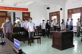 Các bị cáo tại phiên tòa. (Ảnh: Phạm Cường/TTXVN)